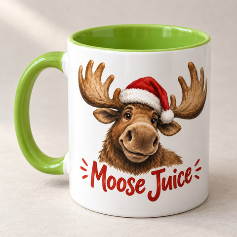 White ceramic mug with a light-green handle and a Santa-hat moose above the words Moose Juice
