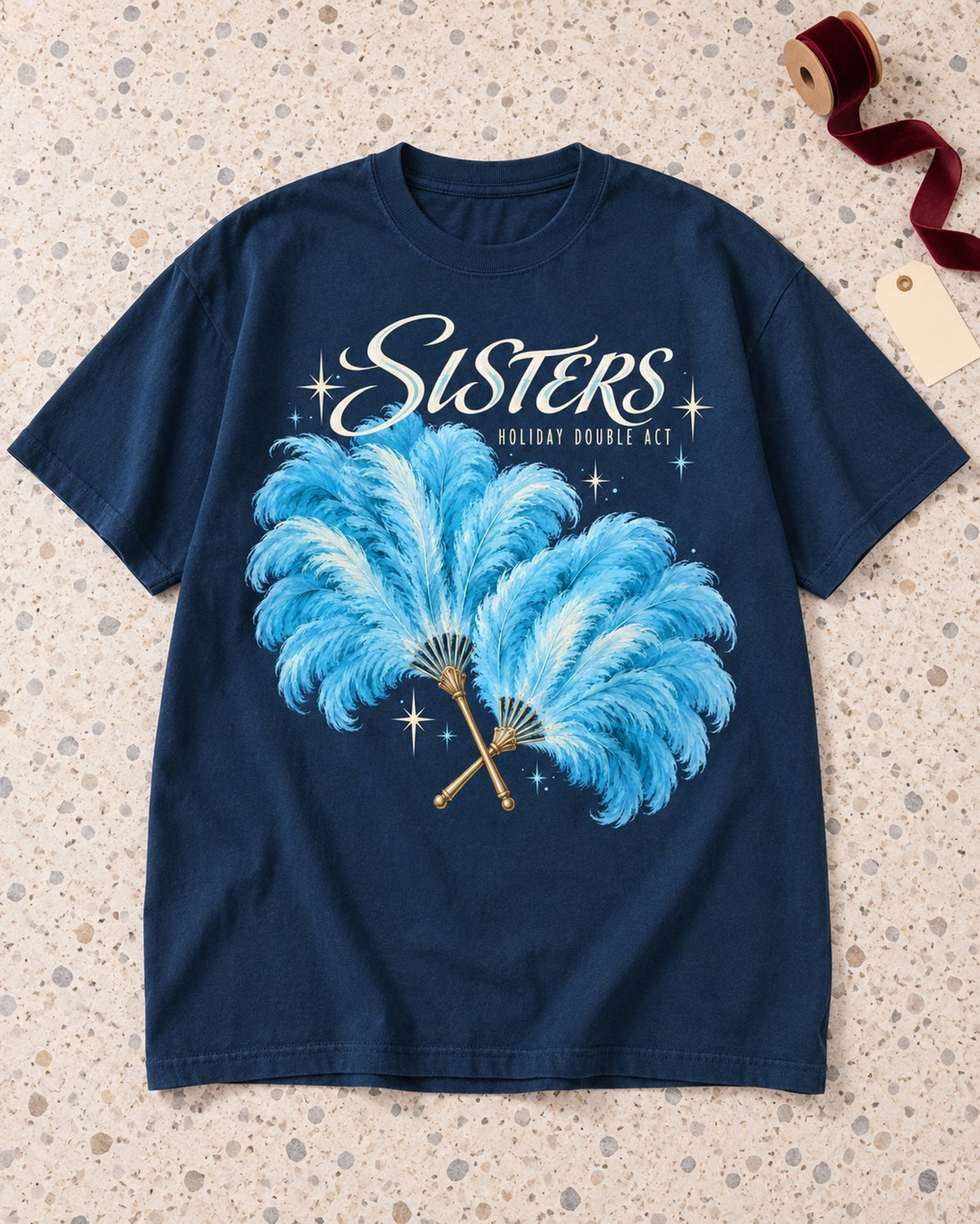 Sisters Holiday Double Act Feather Fan T-Shirt, laid flat