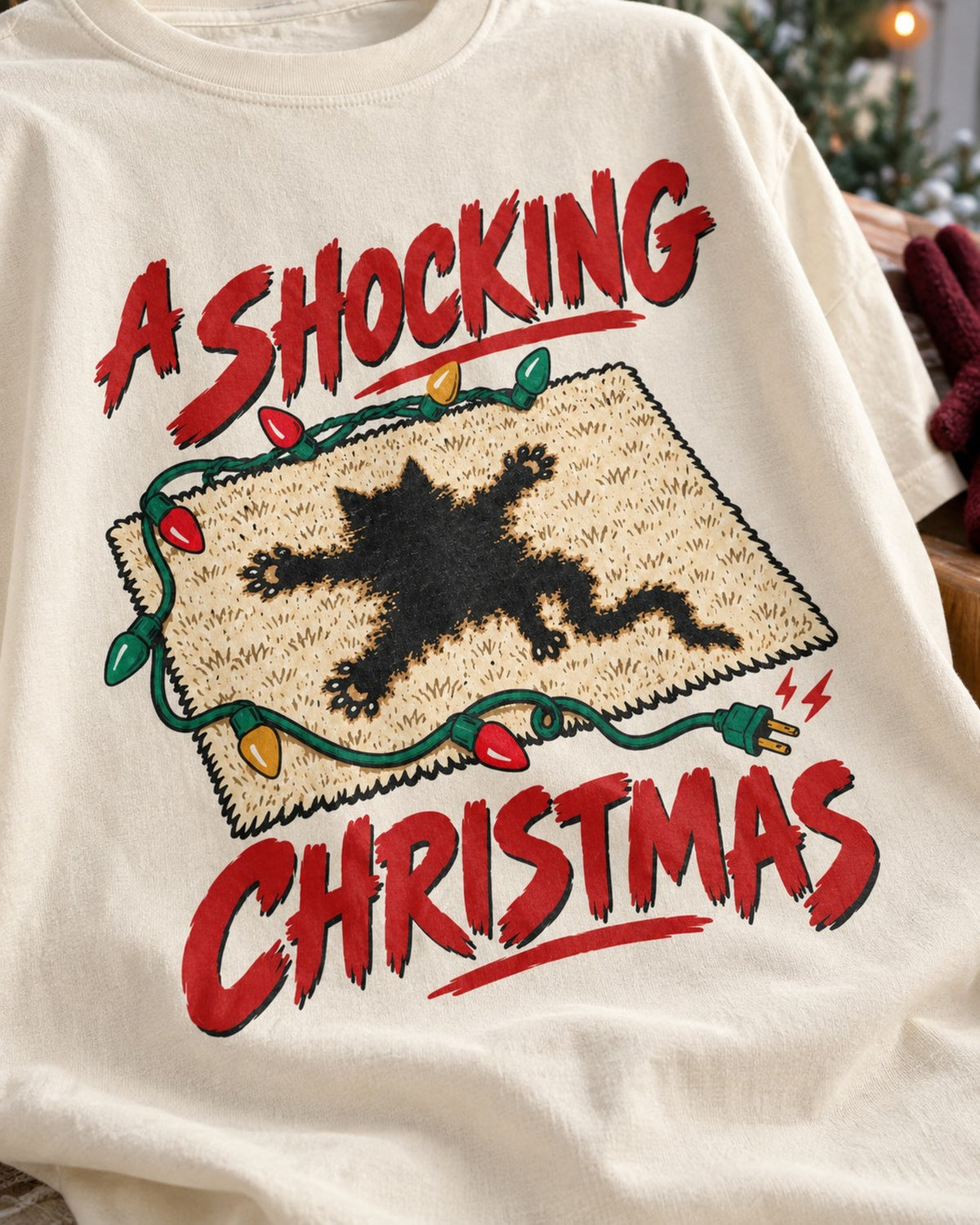 A Shocking Christmas Lights Graphic T-Shirt, close-up of the print