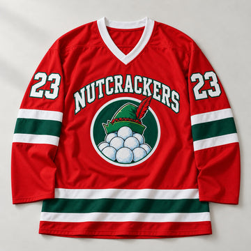 Red Christmas hockey jersey with NUTCRACKERS lettering, an elf hat and snowball badge and number 23 on the sleeves, laid flat
