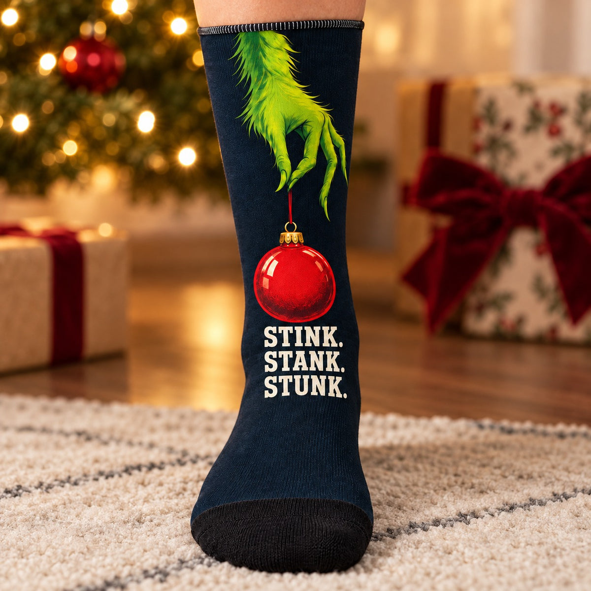 Close-up of the printed sock: Stink Stank Stunk Christmas Crew Socks