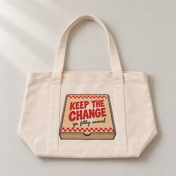 Canvas tote bag with a pizza box print and the words KEEP THE CHANGE, laid flat