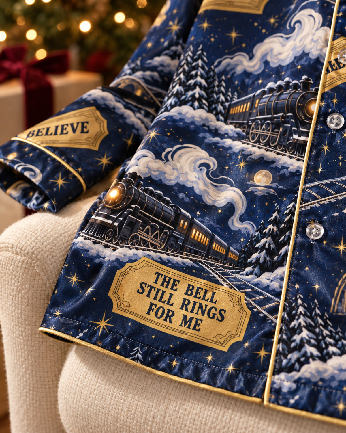 Close-up of the printed satin fabric: Believe Golden Ticket Satin Pajama Set