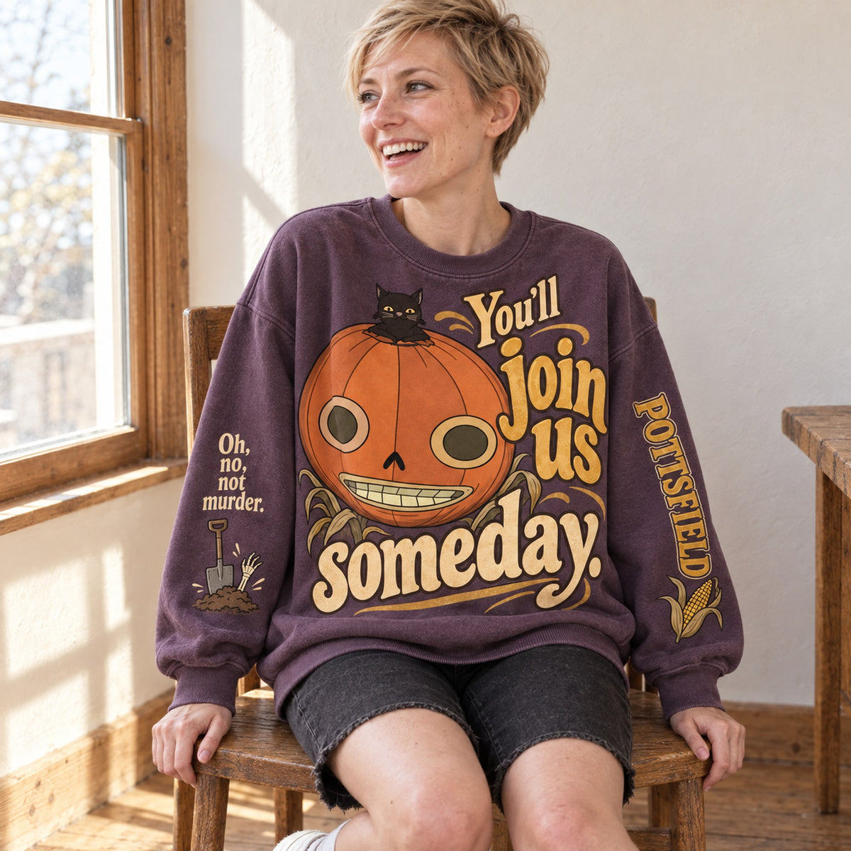 You'll Join Us Someday pumpkin sweatshirt seated