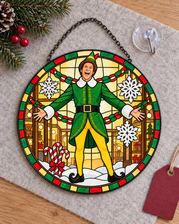 Stained glass suncatcher laid flat with its chain: Christmas Elf Stained Glass Suncatcher